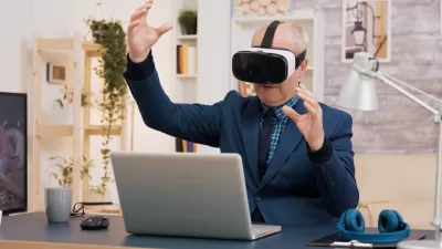 retired man experiencing virtual reality using vr headset living room cup coffee table 400x225